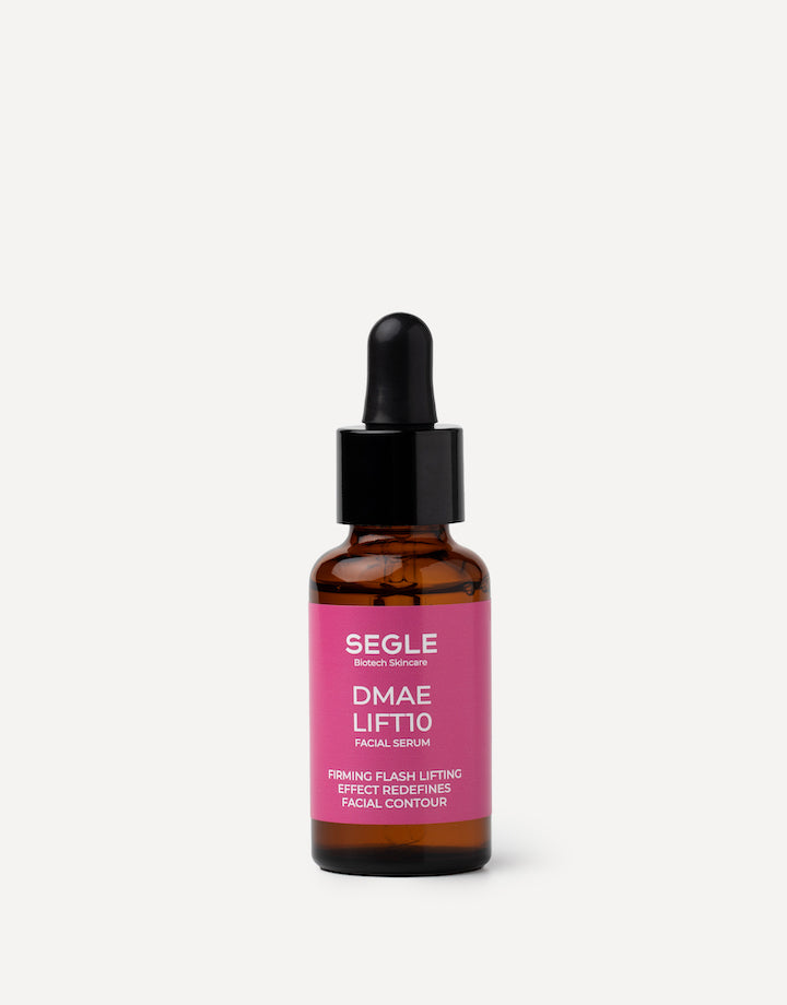 Serúm facial con DMAE en frasco de vidrio ámbar con pipeta.